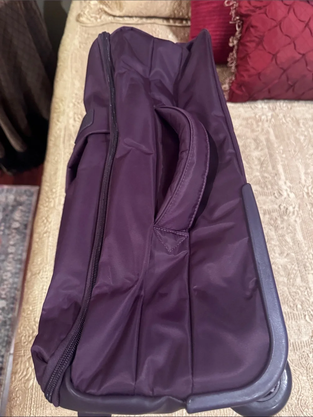 Lipault Men or Wonen’s Rolling Duffel in Deep Plum